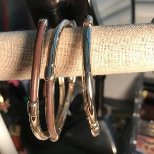 Chico’s stretch bangle. Gold/faux leather look